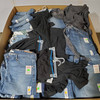 595 units of Clothing & Accessories - MSRP $8,634 - Returns (Lot # 879407)