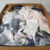 844 units of Clothing & Accessories - MSRP $14,101 - Returns (Lot # 909401)