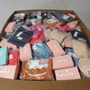 601 units of Clothing & Accessories - MSRP $13,013 - Returns (Lot # 948809)