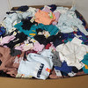 977 units of Clothing & Accessories - MSRP $10,465 - Returns (Lot # 970211)