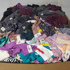 1051 units of Clothing & Accessories - MSRP $10,670 - Returns (Lot # 970910)
