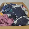 679 units of Clothing & Accessories - MSRP $8,265 - Returns (Lot # 974714)