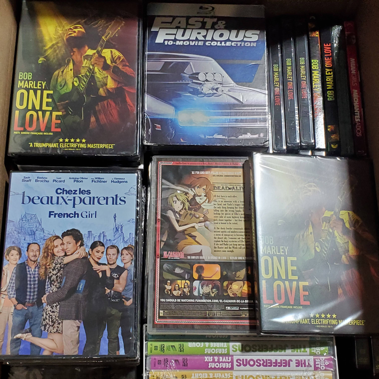 98 units of DVD & Blu-Ray - MSRP $3,334 - Like New (Lot # 816052)