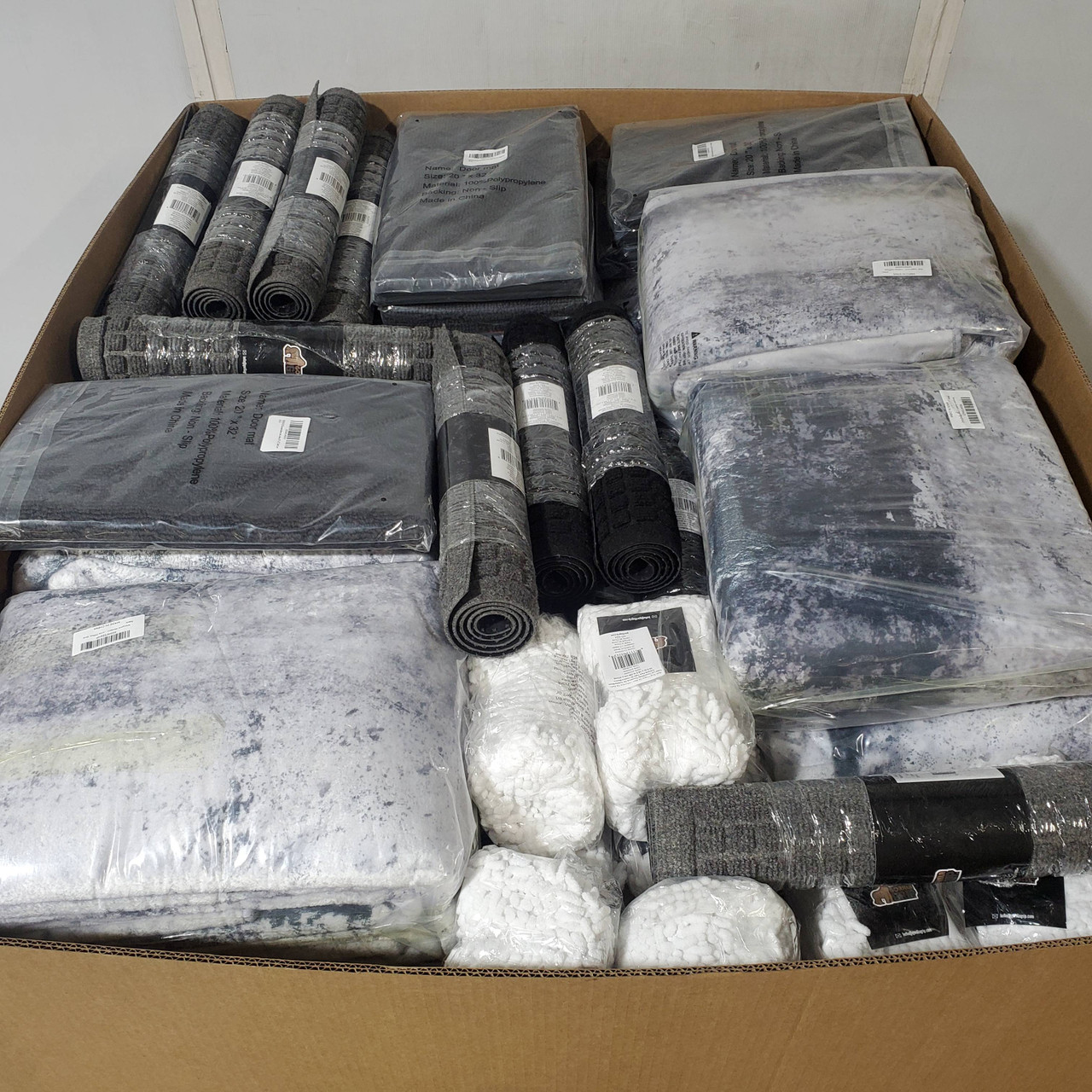 198 units of Mats & Rugs - MSRP $7,431 - Like New (Lot # 939336)