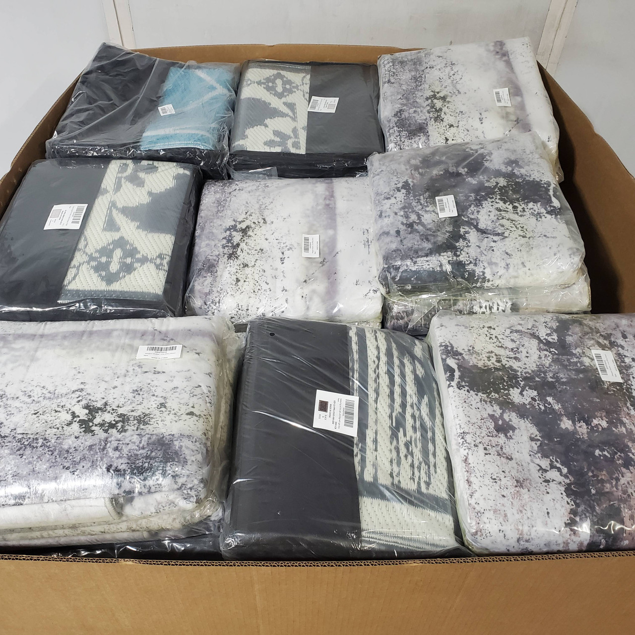 105 units of Mats & Rugs - MSRP $4,070 - Like New (Lot # 933009)