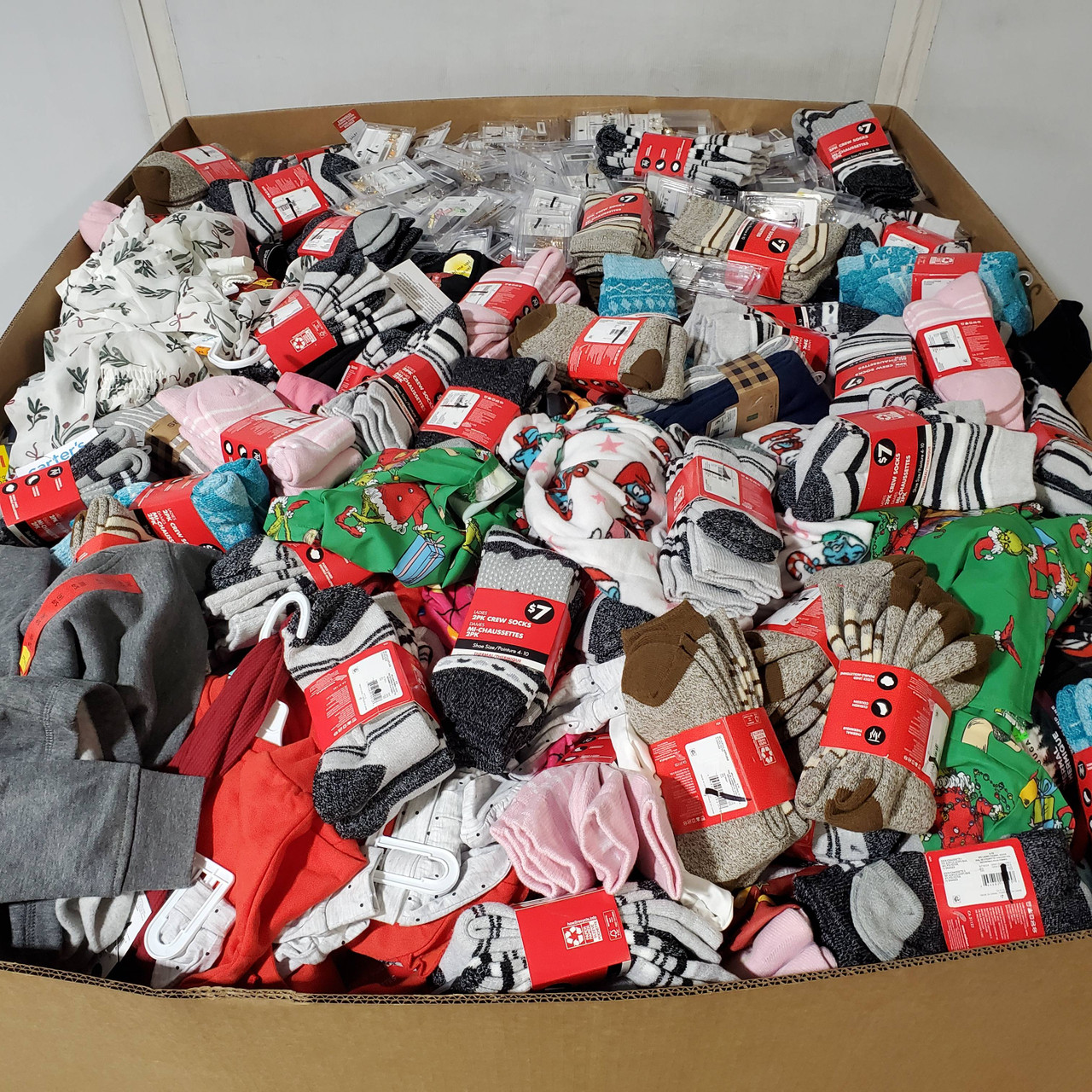 1162 units of Clothing & Accessories - MSRP $15,249 - Returns (Lot # 966608)