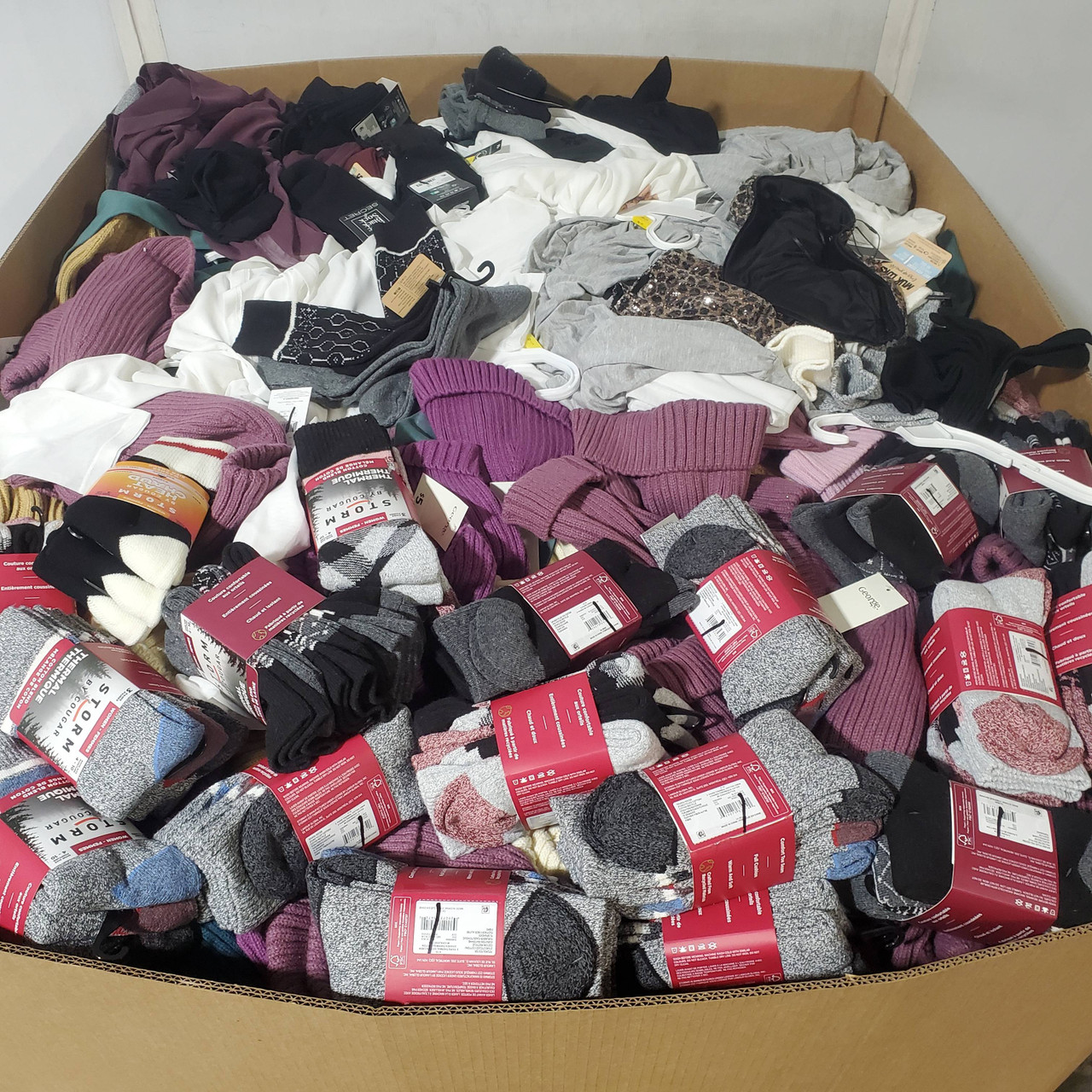 1113 units of Clothing & Accessories - MSRP $12,093 - Returns (Lot # 970112)