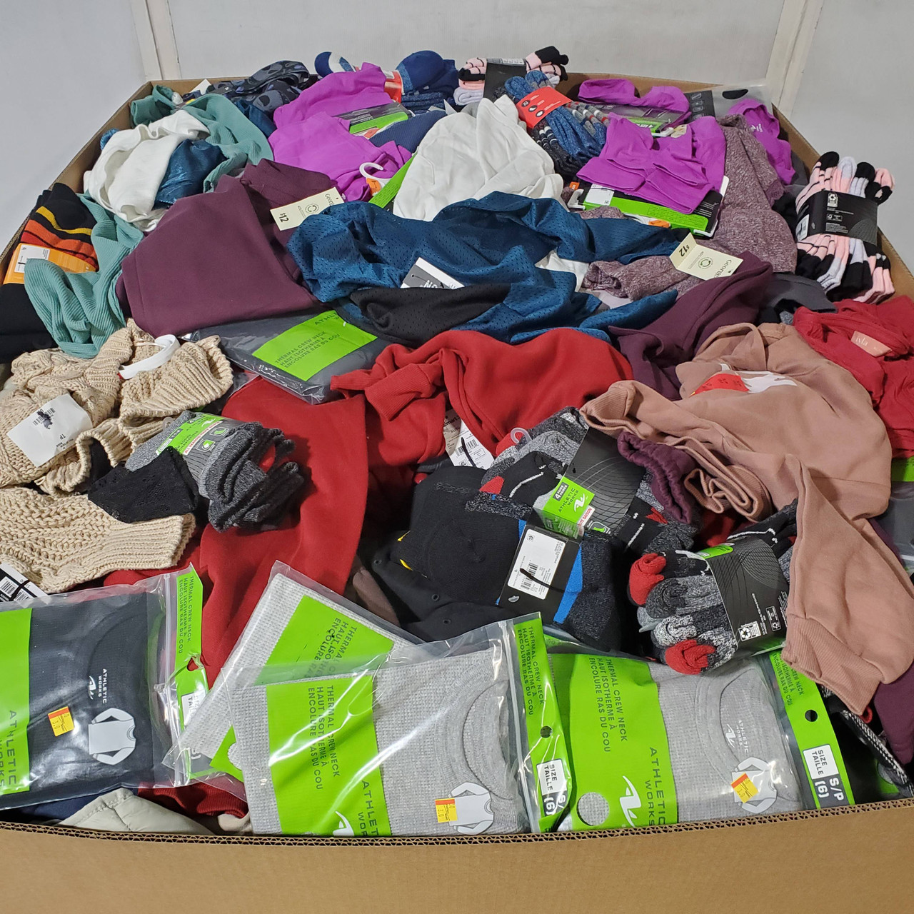 676 units of Clothing & Accessories - MSRP $8,366 - Returns (Lot # 971312)