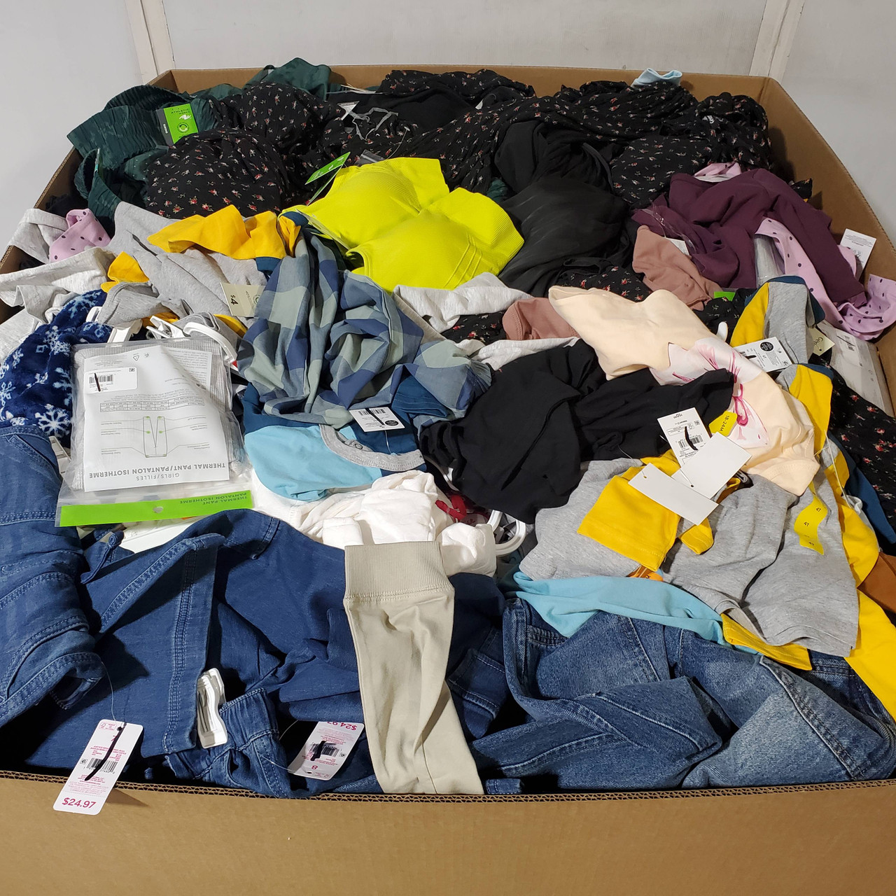 737 units of Clothing & Accessories - MSRP $9,036 - Returns (Lot # 971315)