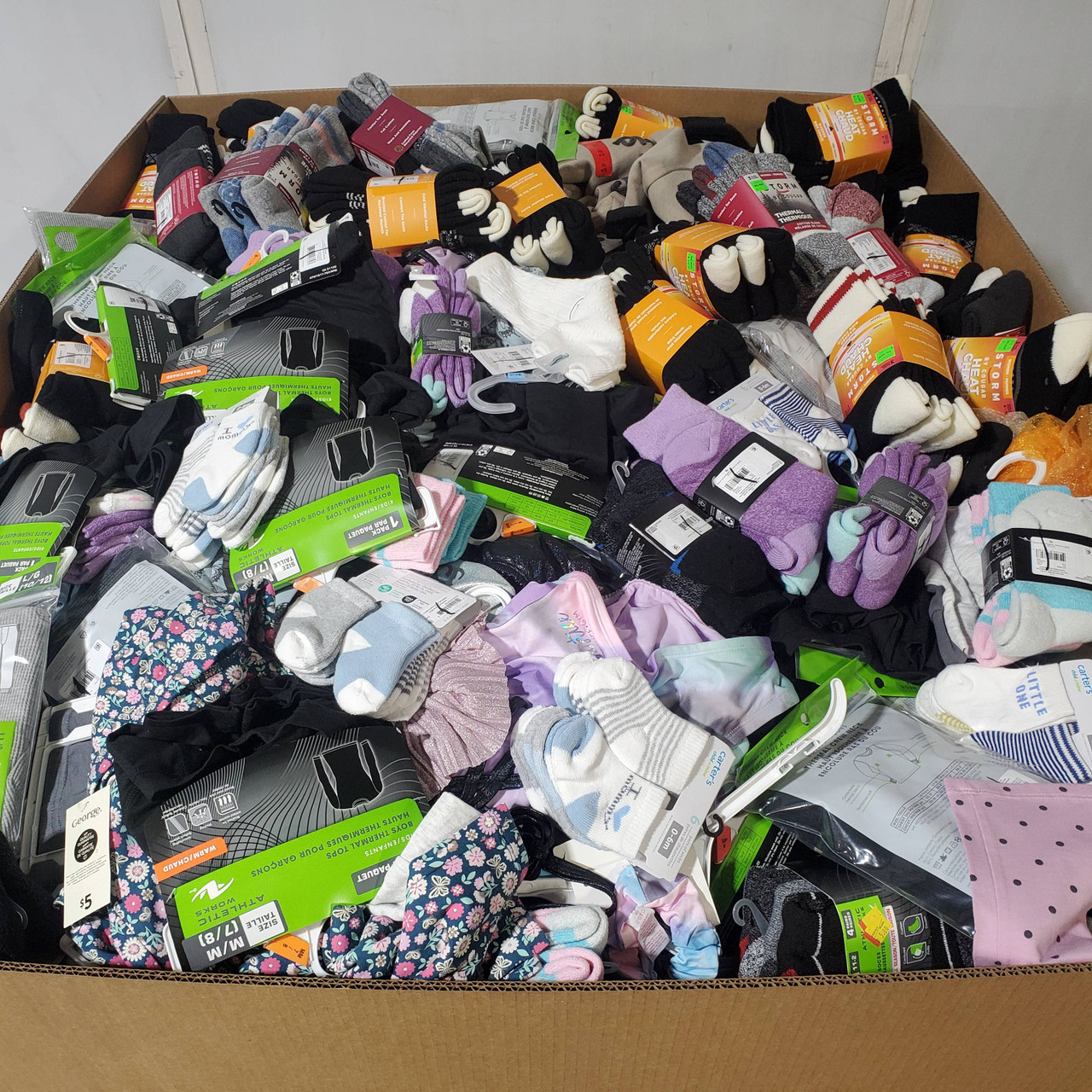 732 units of Clothing & Accessories - MSRP $8,332 - Returns (Lot # 972213)