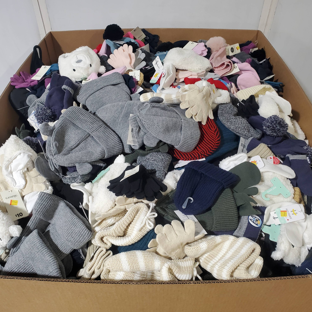 1446 units of Winter Accessories - MSRP $10,504 - Returns (Lot # 972204)