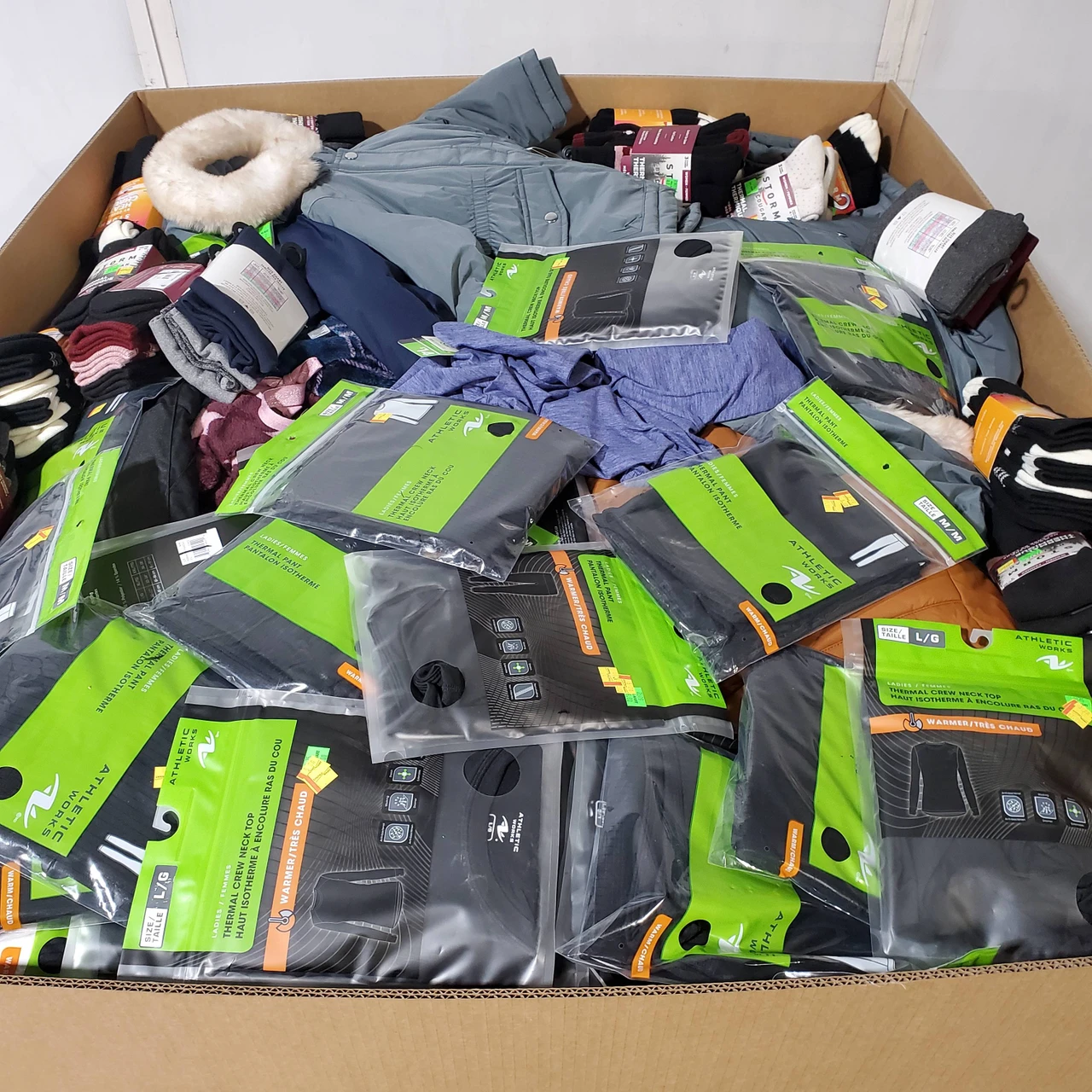 576 units of Clothing & Accessories - MSRP $7,735 - Returns (Lot # 973503)