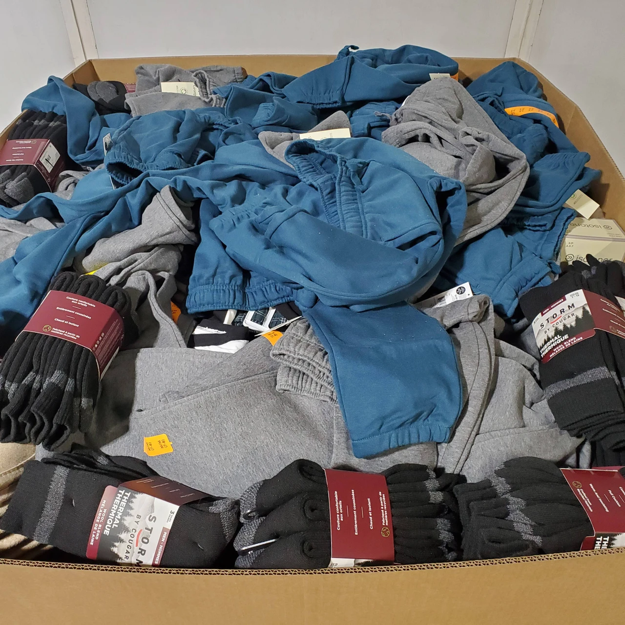 705 units of Clothing & Accessories - MSRP $9,343 - Returns (Lot # 973509)