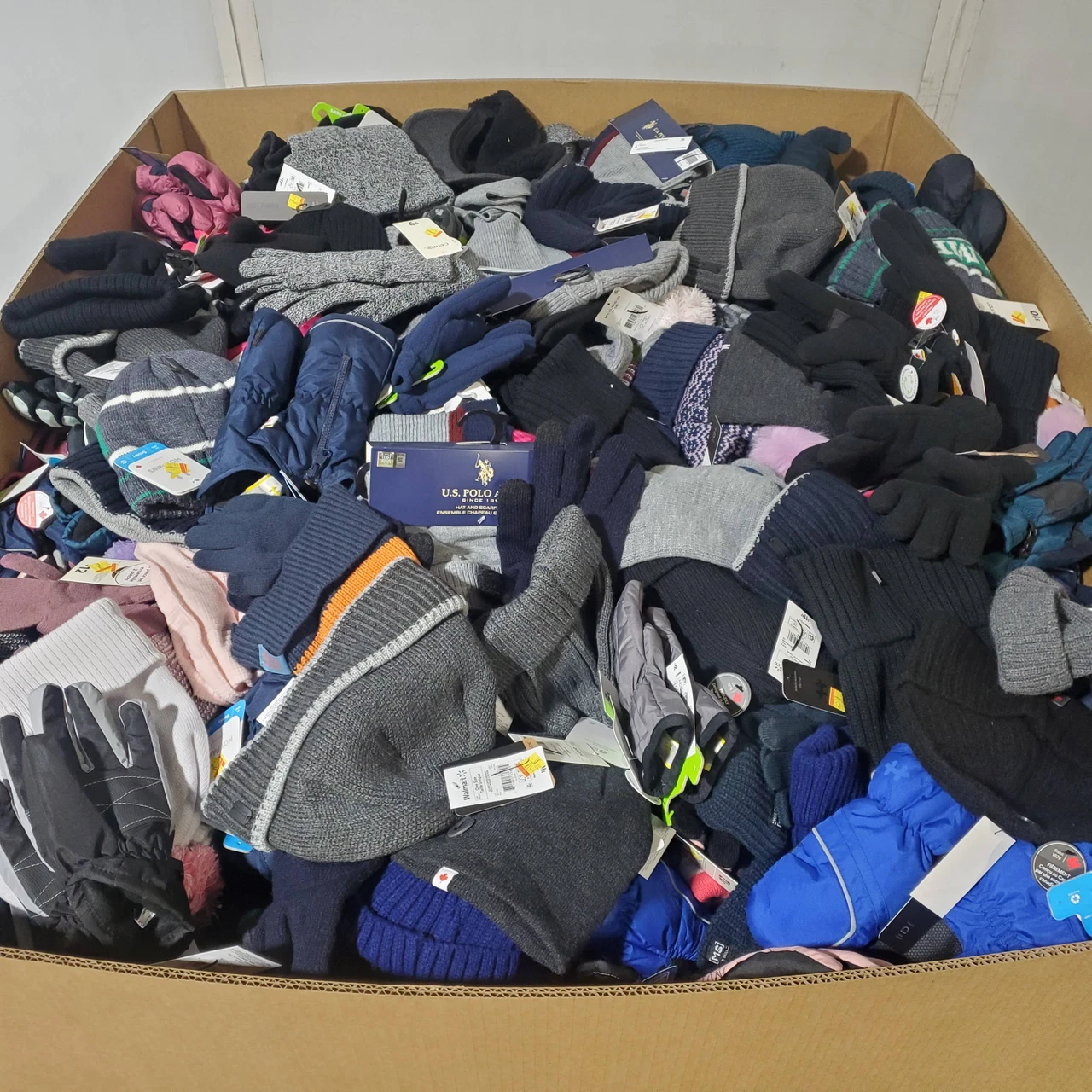 1063 units of Winter Accessories - MSRP $12,524 - Returns (Lot # 974124)