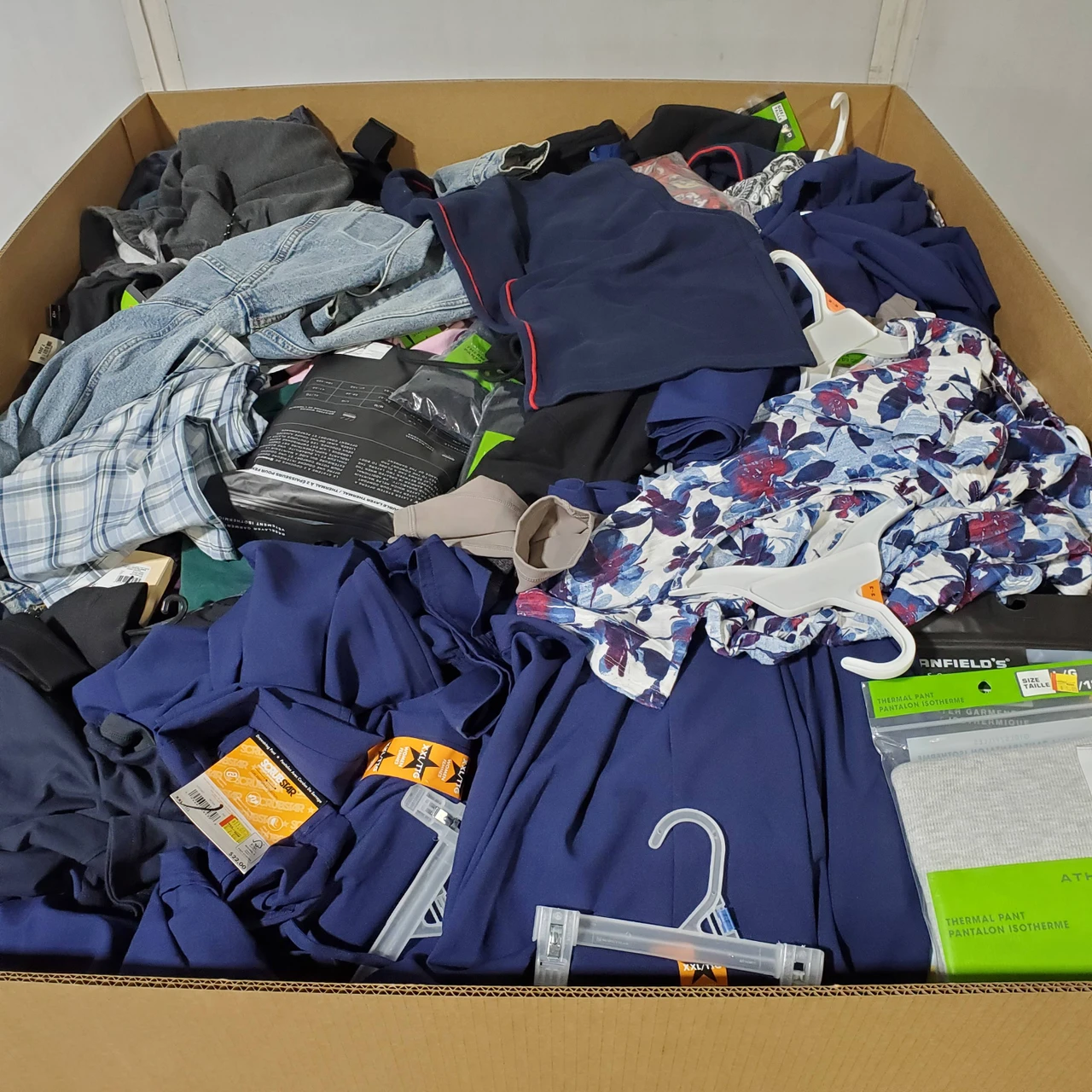 769 units of Clothing & Accessories - MSRP $10,049 - Returns (Lot # 974426)