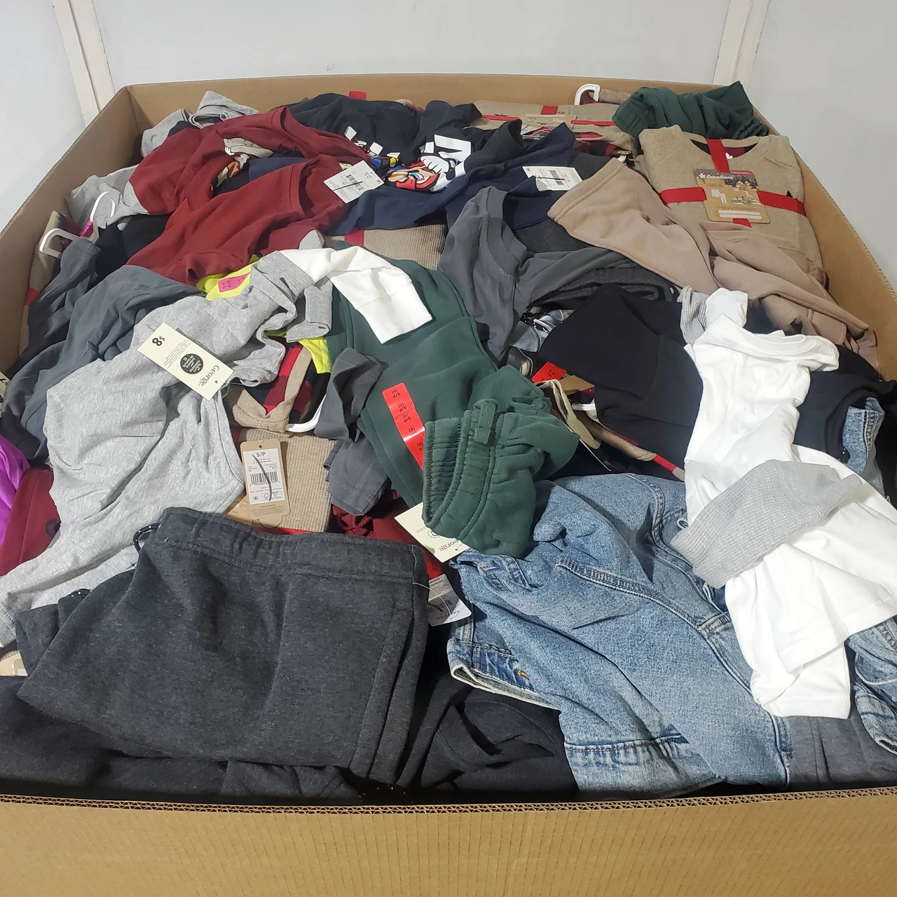 766 units of Clothing & Accessories - MSRP $9,792 - Returns (Lot # 974705)