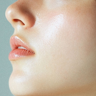 picture of woman's face showing clear complexion