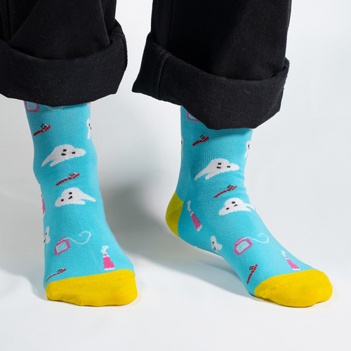 Step into dental style with our Dentist Icons Socks! Featuring a playful pattern of dental symbols like toothbrushes, toothpaste, and smiling teeth, these socks are a whimsical and charming addition to your wardrobe. Crafted for comfort and flair, these socks are perfect for dental professionals or anyone who wants to add a touch of dental charm to their outfit.

Whether you're heading to the dental office or just want to showcase your appreciation for oral health, our Dentist Icons Socks are a fun and unique choice. Stride with dental pride – order your pair today and let your socks make a statement about your passion for healthy smiles!