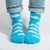 Float into the serene beauty of the sky with our White Clouds on Sky Blue Socks. These socks feature a dreamy pattern of fluffy white clouds against a calming sky blue backdrop, creating a tranquil and picturesque design.

Crafted for comfort and style, these socks are a breath of fresh air for your wardrobe. Whether you're strolling through the city or daydreaming in the countryside, our White Clouds on Sky Blue Socks are the perfect companion for an added touch of whimsy.

Step into the tranquility of the skies with our cloud-inspired socks. Elevate your sock collection with this serene and stylish addition. Order your pair today and let your feet drift into the soothing atmosphere of white clouds on a sky blue canvas.