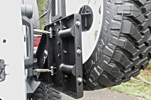 Fab Fours Spare Tire Carrier | Fits 2007-2018 Jeep Wrangler JK | Black Steel, 40 Inch Tire Compatible