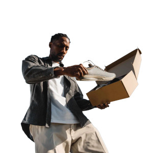 Man Holding Shoe Vinyl Car Decal Sticker – Waterproof & UV-Resistant 