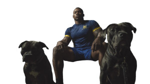 Football Player With Pitbulls Vinyl Car Decal Sticker – Waterproof & UV-Resistant Football Player With Pitbulls Vinyl Car Decal Sticker – Waterproof & UV-Resistant
