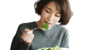 Woman Eating Broccoli Vinyl Car Decal Sticker – Waterproof & UV-Resistant 