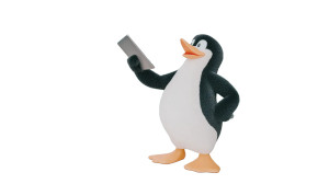 Tux With Tablet Vinyl Car Decal Sticker – Waterproof & UV-Resistant 