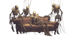 Golden Marionette Skeletons Vinyl Car Decal Sticker – Waterproof & UV-Resistant 2.72"