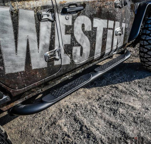 Upgrade Your 2018-2023 Wrangler JL | Westin 4 Inch Oval Nerf Bar | Black Powder Coated Steel | Rocker Panel Mount