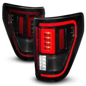 Upgrade your ride with ANZO USA Smoke Lens Tail Light Assembly | Black Housing | LED Bulbs | Red Brake/Sequential Turn Signal/Running Lights & White Reverse Lights