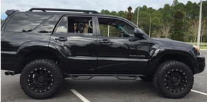 N-Fab Nerf Bar T0365R W2W Series; With Drop Down Steps; 2 Inch Round Bent; Black Matte Textured Powder Coated Steel; Without End Caps; Rocker Panel Mount