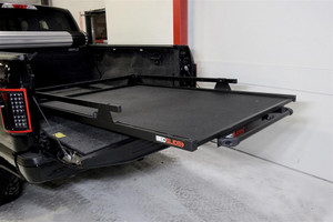 Bedslide Bed Slide 20-7848-HDB Pro HD Series; 2000 Pound Capacity; Black Powder Coated Steel Frame; Black Side Rail; Urethane Coated Black Composite Honeycomb Platform; Bolts to truck bed Bedslide Bed Slide 20-7848-HDB Pro HD Series; 2000 Pound Capacity; Black Powder Coated Steel Frame; Black Side Rail; Urethane Coated Black Composite Honeycomb Platform; Bolts to truck bed