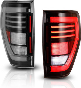 Fits 2009-2014 Ford F-150 Winjet Tail Light Assembly CTWJ-0706-GBC-SQ Clear Lens; Gloss Black ABS Plastic Housing; LED Bulb; Set Of 2
