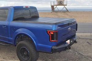 LEER HF650M Hard Folding Truck Bed Cover | 2015-2023 Ford F-150 | Black Matte Fiberglass | Lockable | CYNC Latching System LEER HF650M Hard Folding Truck Bed Cover | 2015-2023 Ford F-150 | Black Matte Fiberglass | Lockable | CYNC Latching System