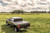 Maximize Cargo Space with Roll-N-Lock M-Series XT Tonneau Cover | Secure Manual Retractable Black Cover with T-Slot Rails