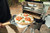 Magma Heavy-Duty Stainless Steel Pizza Spatula/Peel | Fold-In Wood Handle | 12 Inch| Magnum Logo