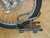 Sturdy Motorcycle Wheel Chock | Secure Your Bike For Towing/Storage | Space-Saving Black/Gray Design