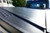 Roll-N-Lock E-Series Power Retractable Tonneau Cover | Compact Housing, Remote Control, Black Matte Aluminum