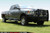 Upgrade Your Ram 2500/3500 Bumper | Fab Fours Black Steel | Pre-Runner Guard | With Grille Guard, Tow Hooks, Fog Light Cutouts
