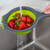 Green & Gray Silicone Collapsible Hand Strainer | 1.5 Quart Capacity | Dishwasher Safe | Non-Skid Feet | Wash & Strain Easily