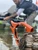 Secure your gear with ease | Orange Brush Gripper with 8ft Rope - Yak Gear