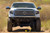 DV8 Offroad Bumper FBTT2-06 Spec Series; Modular Design; High Clearance; Direct Fit; Mounting Hardware Included; With 2 D-Ring Shackles; With Four 3 Inch Light Pod Cutouts; Powder Coated; Black; Steel