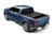 Fits 2016-2023 Toyota Tacoma UnderCover Tonneau Cover SL44015 Select; Hard Folding; Low Profile; 2 Folds/3 Panels; Matte Black Powder Coated; Aluminum
