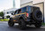 Fits 2021-2025 Ford Bronco Steelcraft Bumper 76-21350 Fortis; One Piece Design; Direct Fit; Mounting Hardware Included; With D-Ring Mount; Compatible With OE Hitch; With 3 Inch Cube Light Cutouts; Powder Coated; Matte Black; Steel