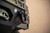 Fits 2021-2023 Ford F-150 DV8 Offroad Bumper FBFF1-11 Spec Series; Modular Design; High Clearance; Direct Fit; Bolt-On; Mounting Hardware Included; With Winch Mount; With 2 D-Ring Shackles; With Two 3 Inch Light Pod Cutouts; Powder Coated; Black
