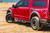 2018-2023 Jeep Wrangler JL N-Fab Nerf Bar | Drop Down Steps | Angular Style | Textured Black Steel | Rocker Panel Mount
