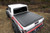 2020-2023 Jeep Gladiator JT | Roll-N-Lock Tonneau Cover | Manual Retractable, Lockable | Black Vinyl M-Series