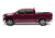 Transform Your Ram 1500 with UnderCover Hard Folding Tonneau Cover | 2 Folds/3 Panels, Non-Lockable, Black Aluminum Design