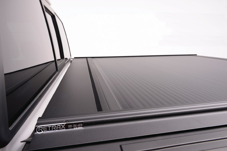 RetraxPro MX Manual Retractable Tonneau Cover | Key Lockable | Black Matte | Aluminum | Fits Any Position | Strength To Support 500+ lbs | Smooth One-Hand Operation | Low-Profile | UV Protected | Lifetime Warranty
